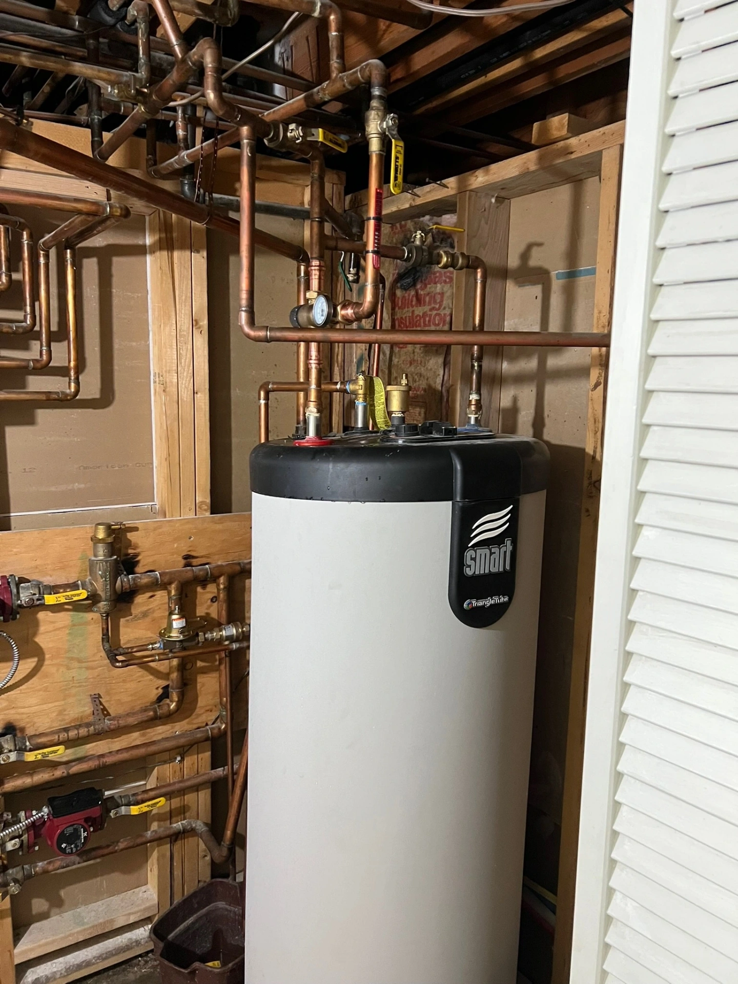 Indirect water heater and custom copper manifold